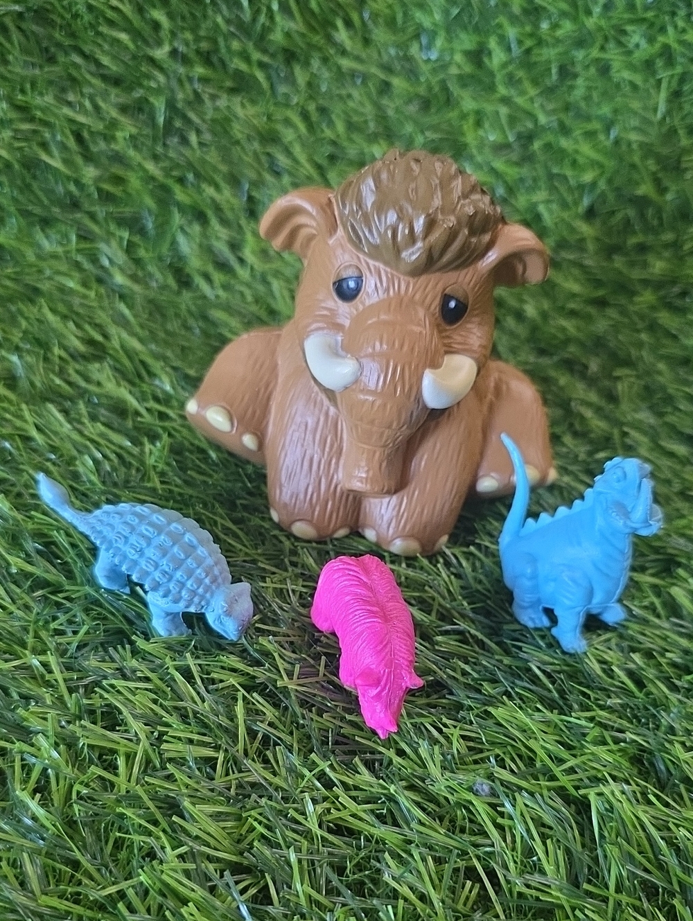 Wooly Mammoth Squish Toy W Plastic Dinosaurs
